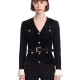 Top scollo a V in maglia in nero 