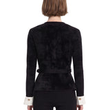 Top scollo a V in maglia in nero 
