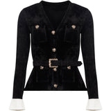 Top scollo a V in maglia in nero 