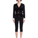 Top scollo a V in maglia in nero 