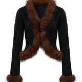 Cardigan con pelliccia in nero 