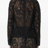 Blusa in pizzo in nero 