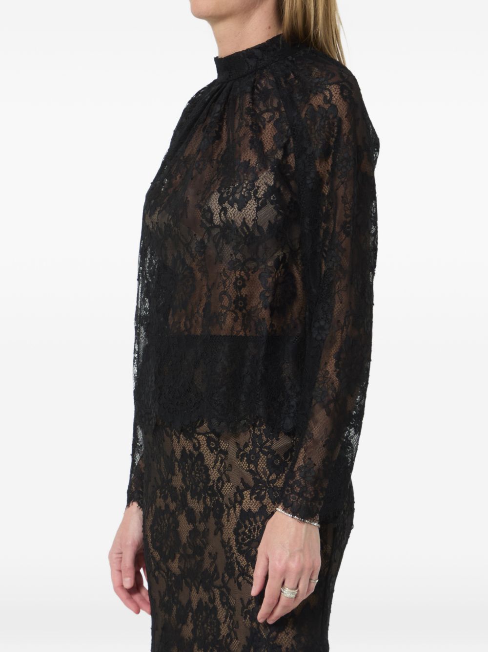 Blusa in pizzo in nero 
