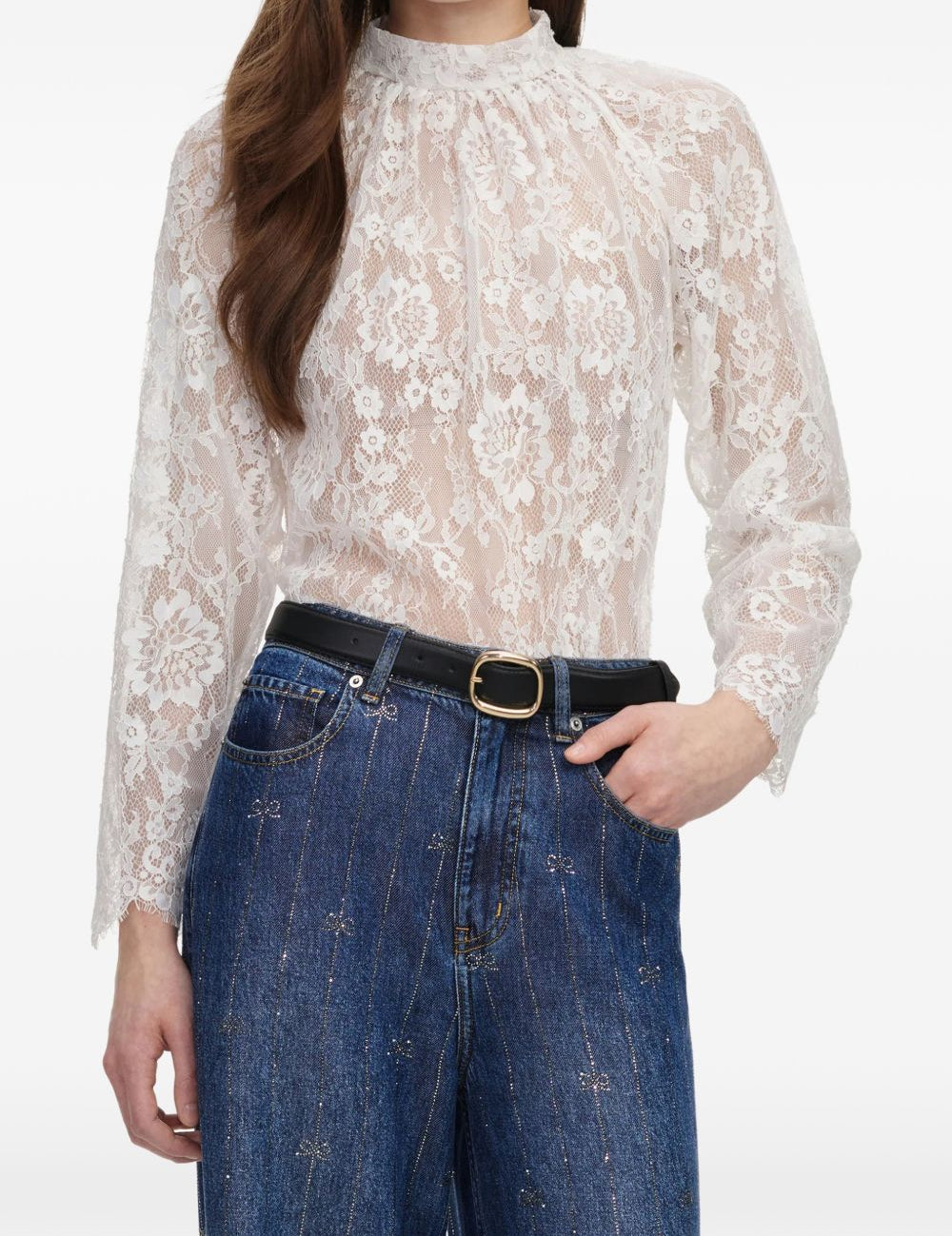 Blusa in pizzo in bianco 
