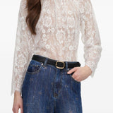 Blusa in pizzo in bianco 