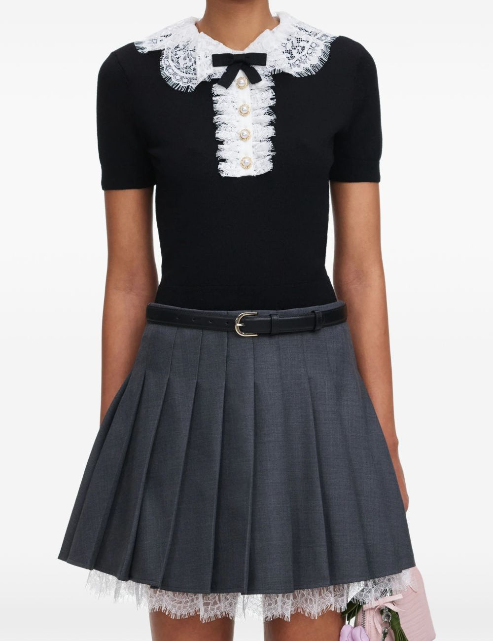 Polo con colletto in pizzo in nero 