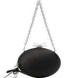 Clutch con chiusura a fermaglio con fiocco in nero 