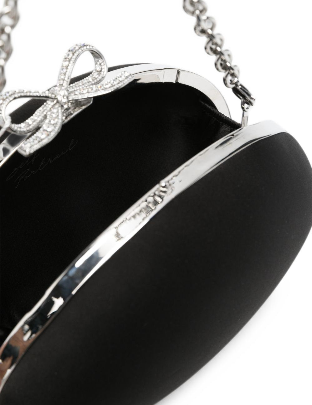 Clutch con chiusura a fermaglio con fiocco in nero 
