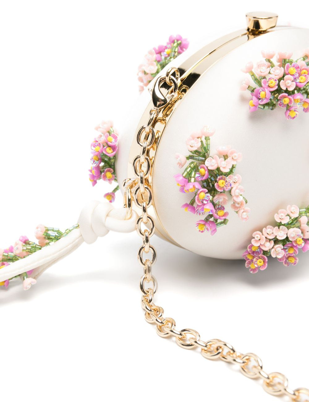 Clutch ovale con fiori in crema 