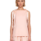 Top con fiocchi in rosa 