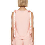 Top con fiocchi in rosa 
