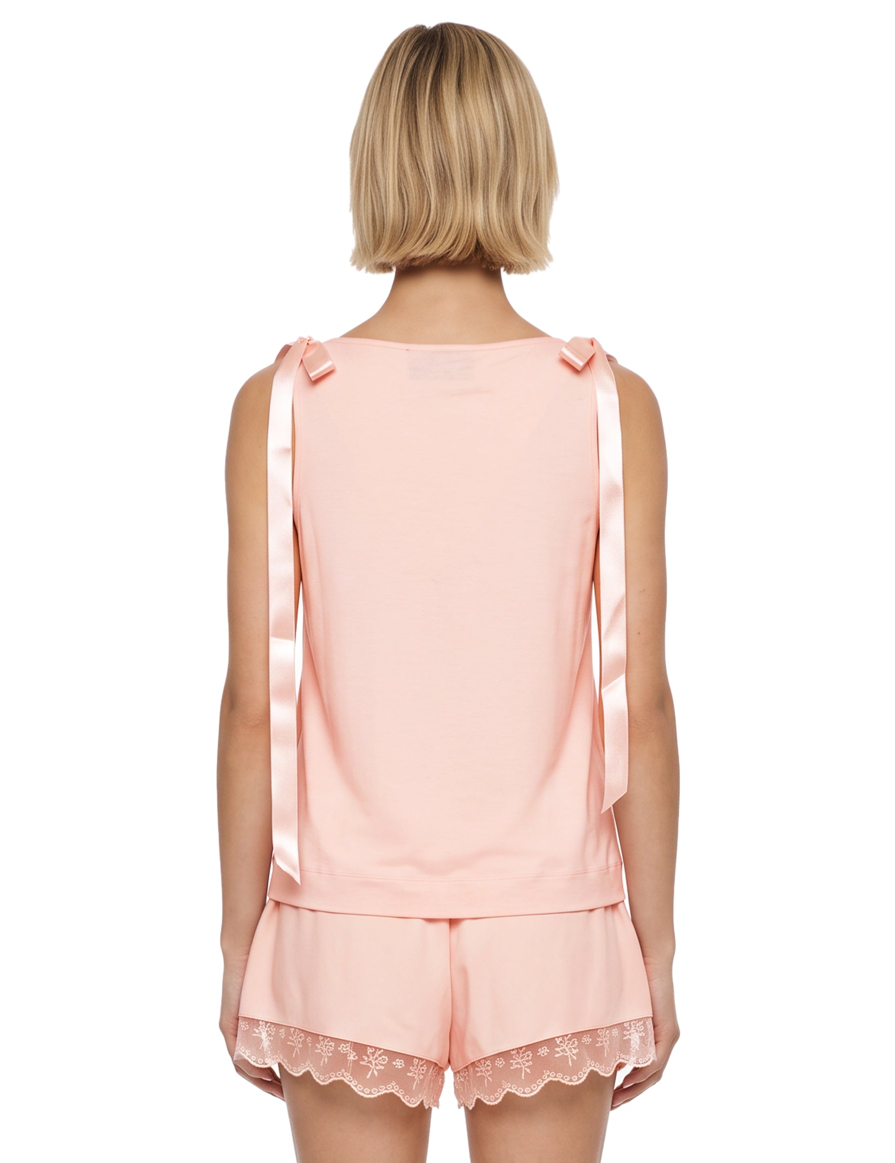 Top con fiocchi in rosa 