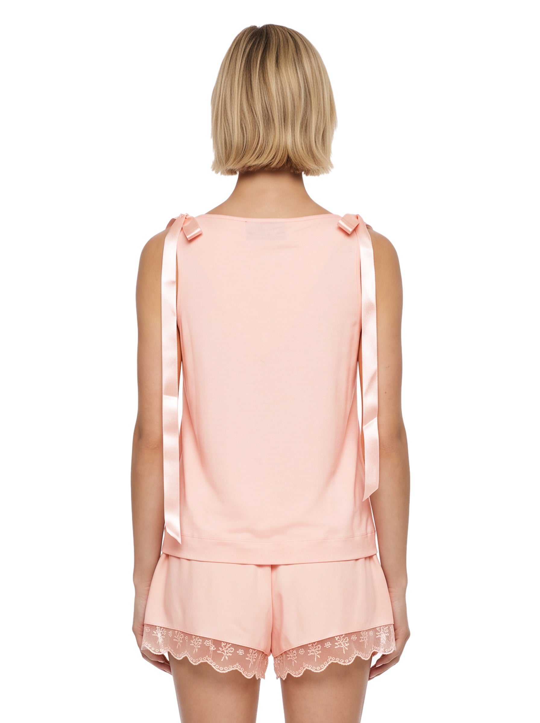 Top con fiocchi in rosa 