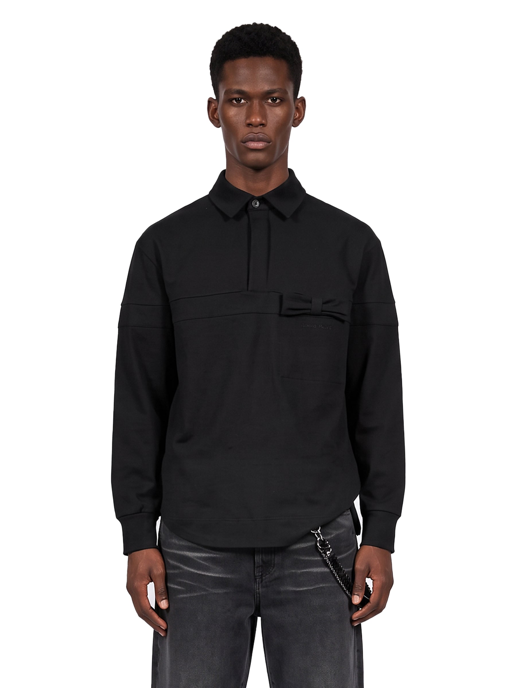Polo camicia con fiocco in nero 
