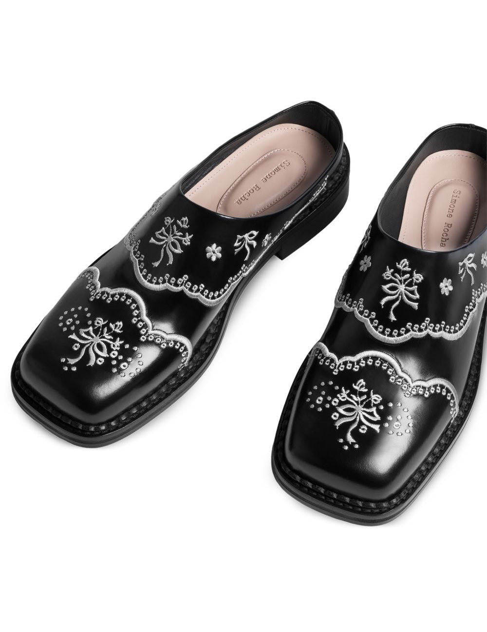 Mules in pelle con pizzo floreale in nero 