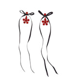 Orecchini Mini Daisy Drop in nero e rosso 