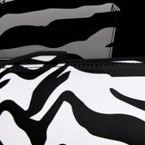 Clutch con stampa zebrata 8.30 pm in nero e bianco 