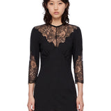 Abito mini con inserti in pizzo in nero 