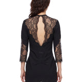 Abito mini con inserti in pizzo in nero 