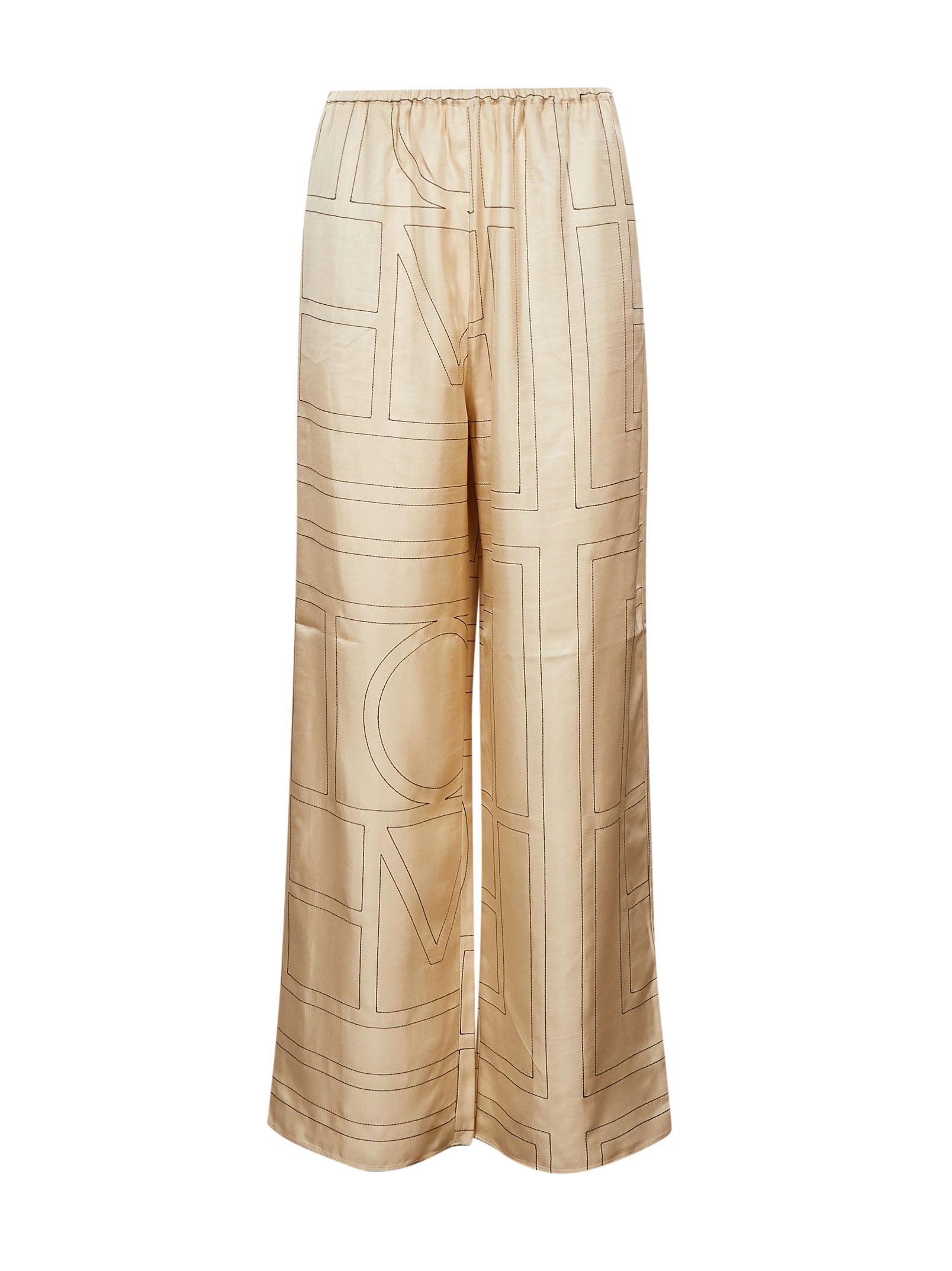 Pantaloni in seta con stampa monogramma in beige 