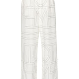 Pantaloni con monogramma ricamato in bianco Toteme - donna 