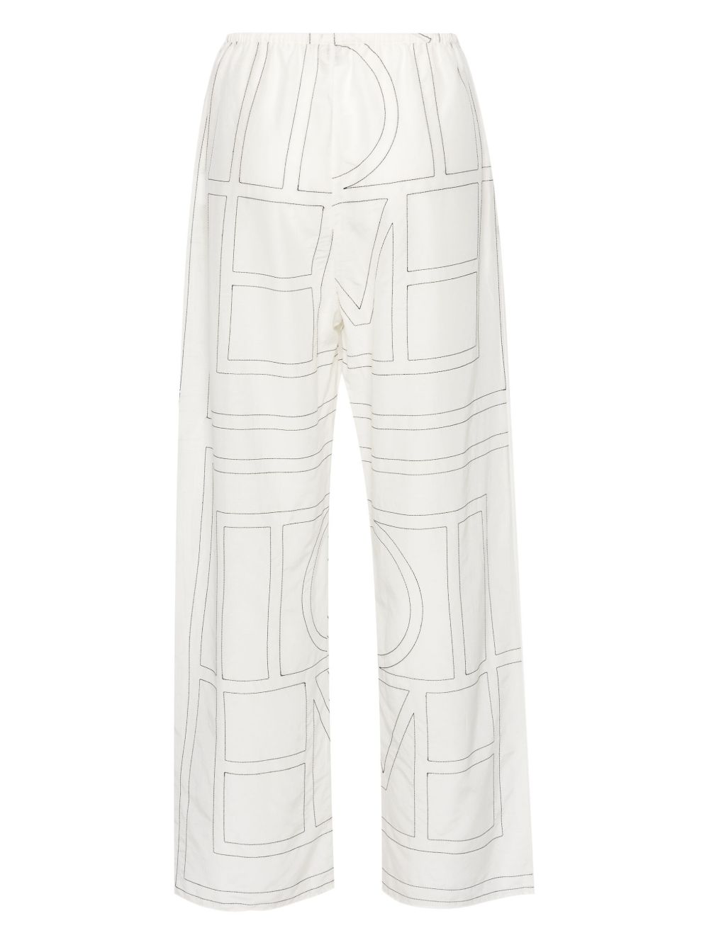 Pantaloni con monogramma ricamato in bianco Toteme - donna 