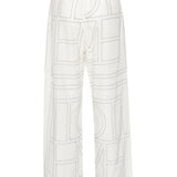 Pantaloni con monogramma ricamato in bianco Toteme - donna 