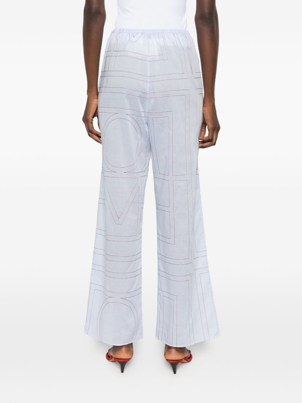 Pantaloni con stampa logo in azzurro Toteme - donna 