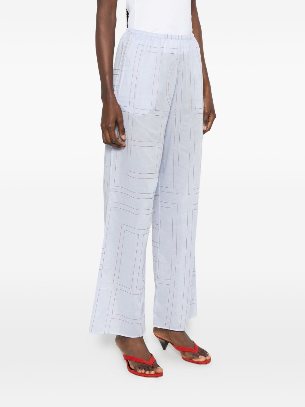 Pantaloni con stampa logo in azzurro Toteme - donna 