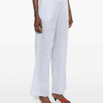 Pantaloni con stampa logo in azzurro Toteme - donna 