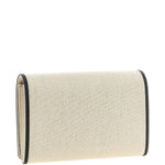 Clutch in tela con falda a T in beige 