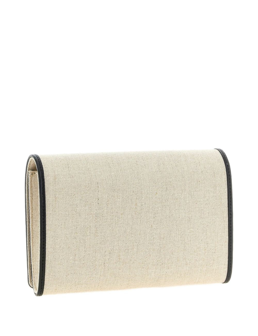 Clutch in tela con falda a T in beige 