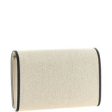 Clutch in tela con falda a T in beige 
