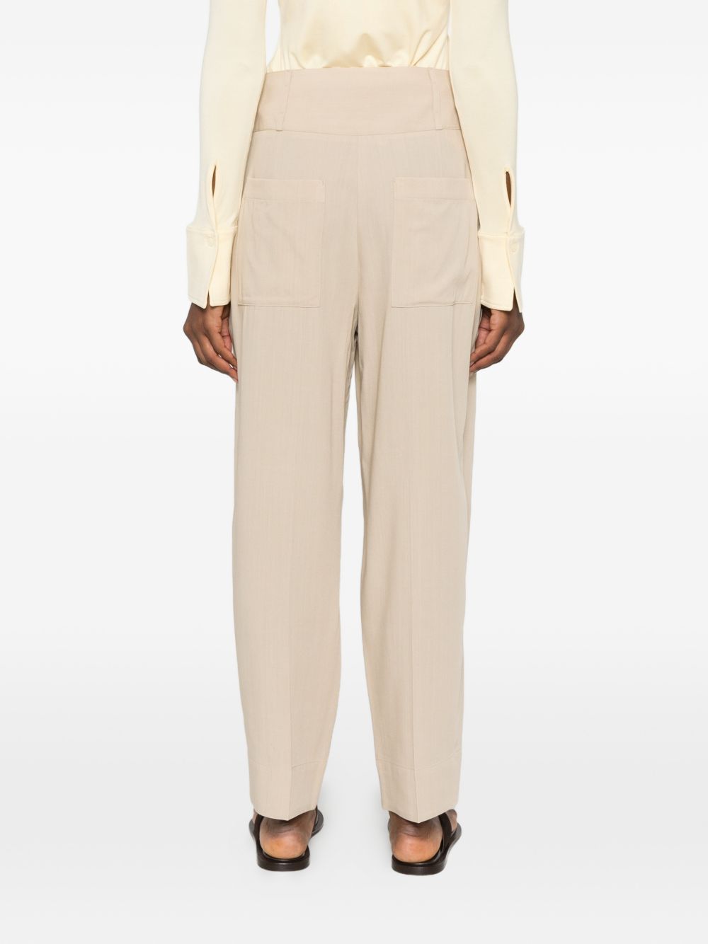 Pantaloni a vita alta con pieghe in beige Toteme - donna 