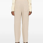 Pantaloni a vita alta con pieghe in beige Toteme - donna 