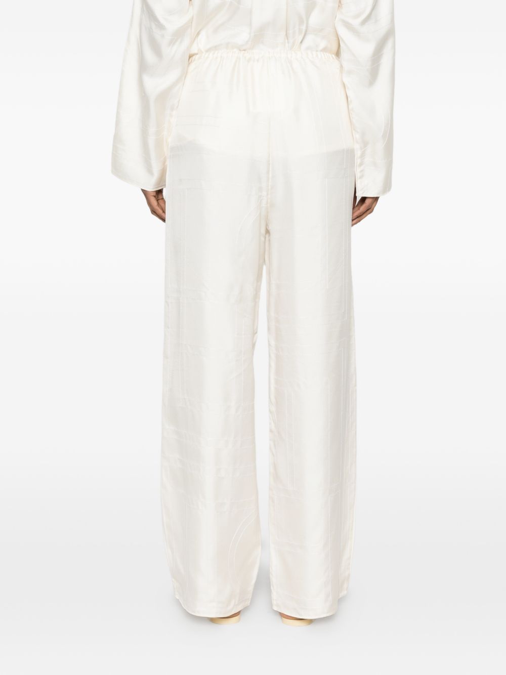 Pantaloni palazzo di seta in avorio Toteme - donna 