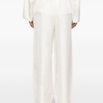 Pantaloni palazzo di seta in avorio Toteme - donna 
