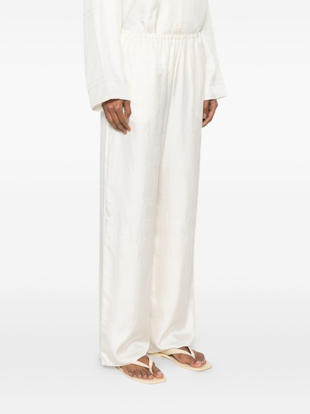 Pantaloni palazzo di seta in avorio Toteme - donna 