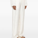 Pantaloni palazzo di seta in avorio Toteme - donna 