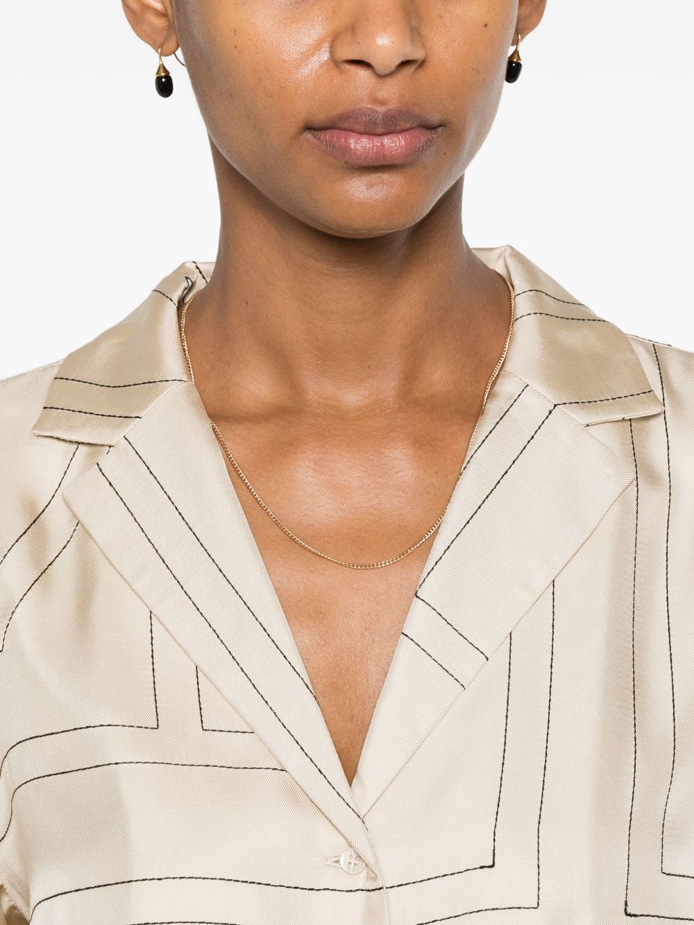 Camicia con stampa monogramma in beige 