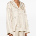 Camicia con stampa monogramma in beige 