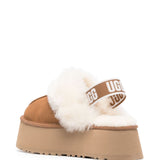 Mules Funkette con cinturino in beige 