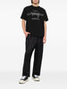 T-shirt con stampa grafica in nero