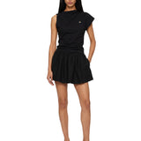Top asimmetrico con logo in nero 