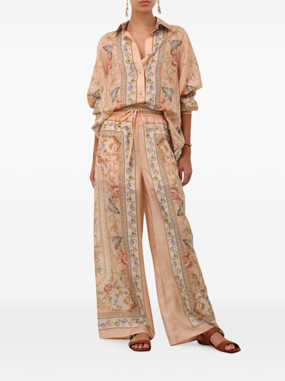 Pantaloni Roselight in seta floreale rosa 
