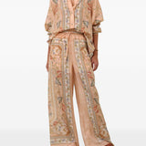 Pantaloni Roselight in seta floreale rosa 