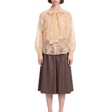 Blusa Valiant in pizzo con fiocco in beige 