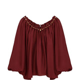 Blusa con decorazioni di perline Aster in bordeaux 