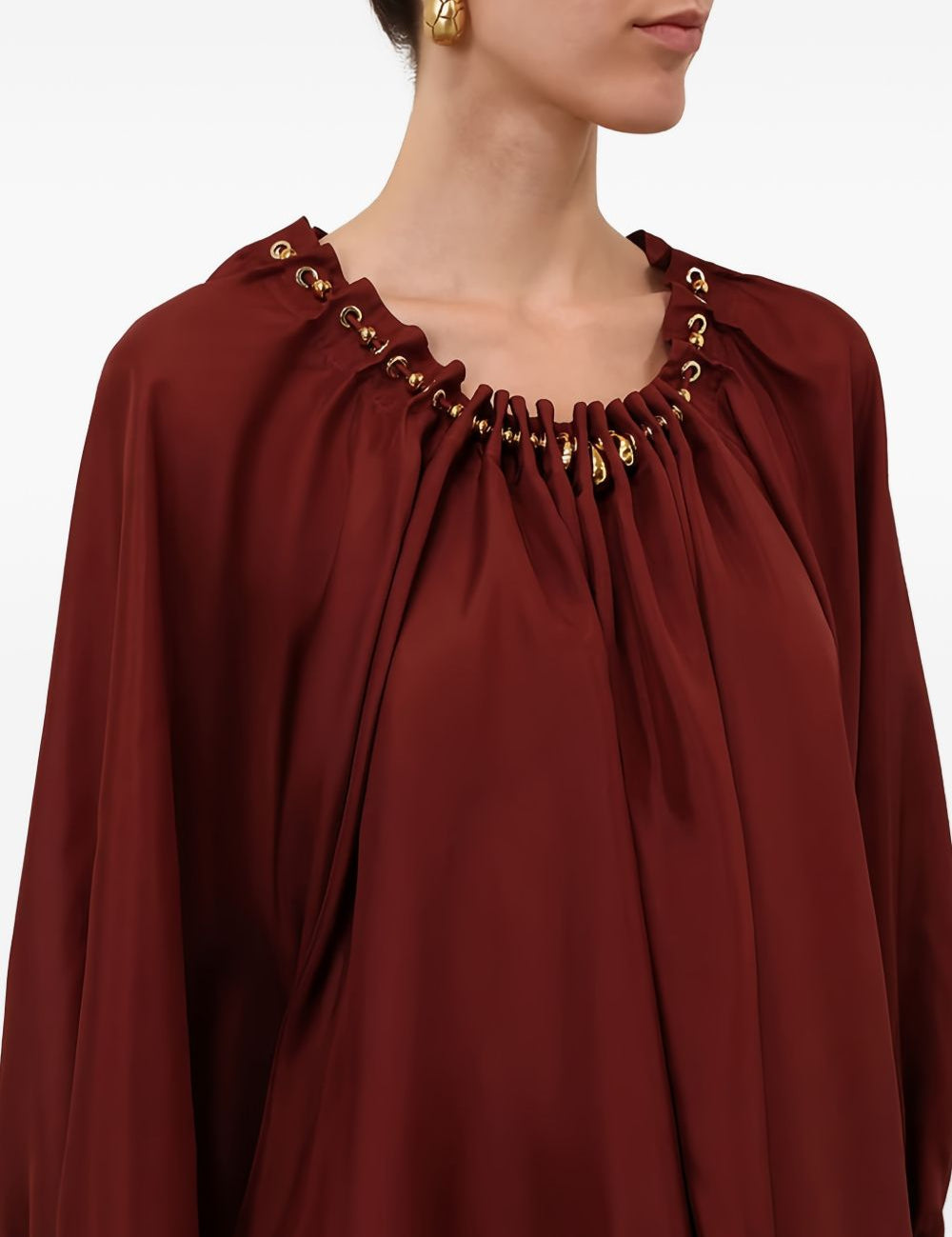 Blusa con decorazioni di perline Aster in bordeaux 