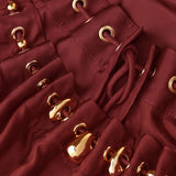 Blusa con decorazioni di perline Aster in bordeaux 
